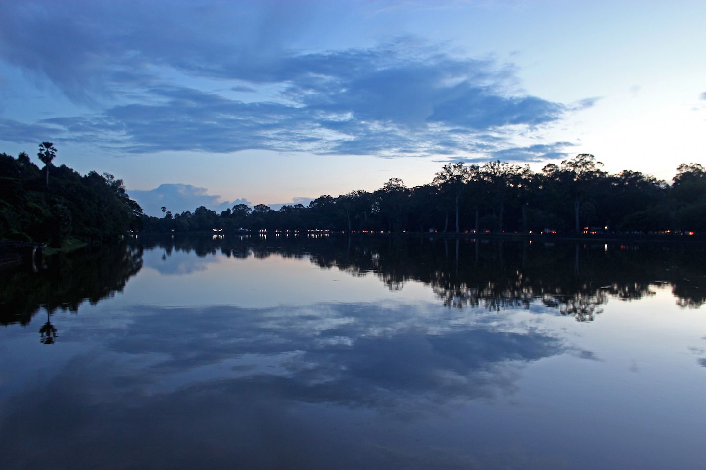 Sunset over the moat of Angkor Wat