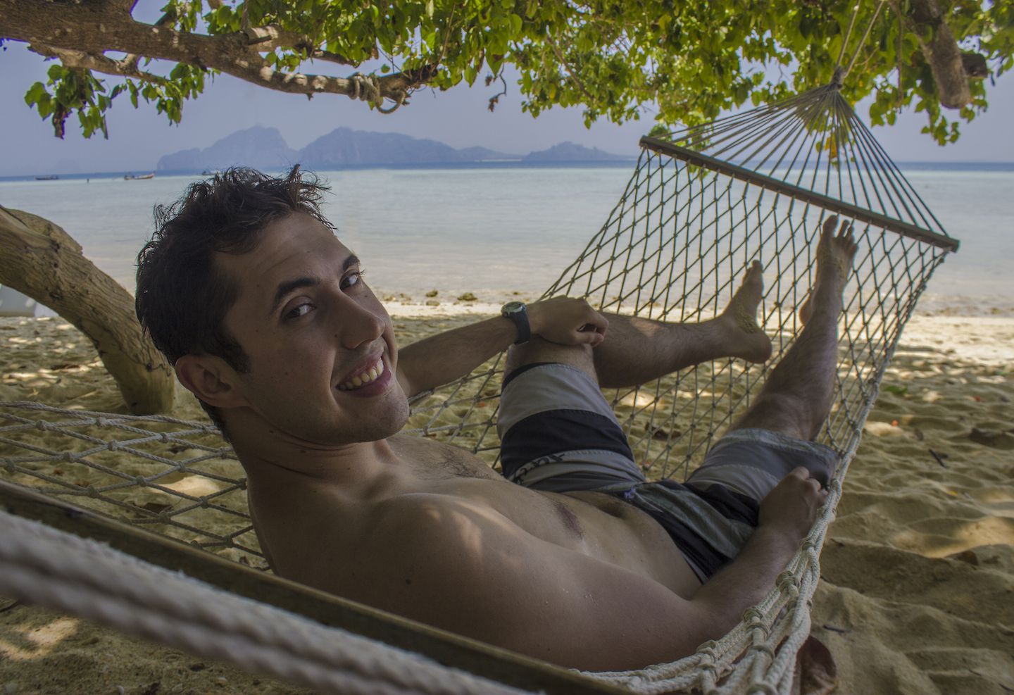 Carlos lying on the hammock on Koh Kradan, Thailand