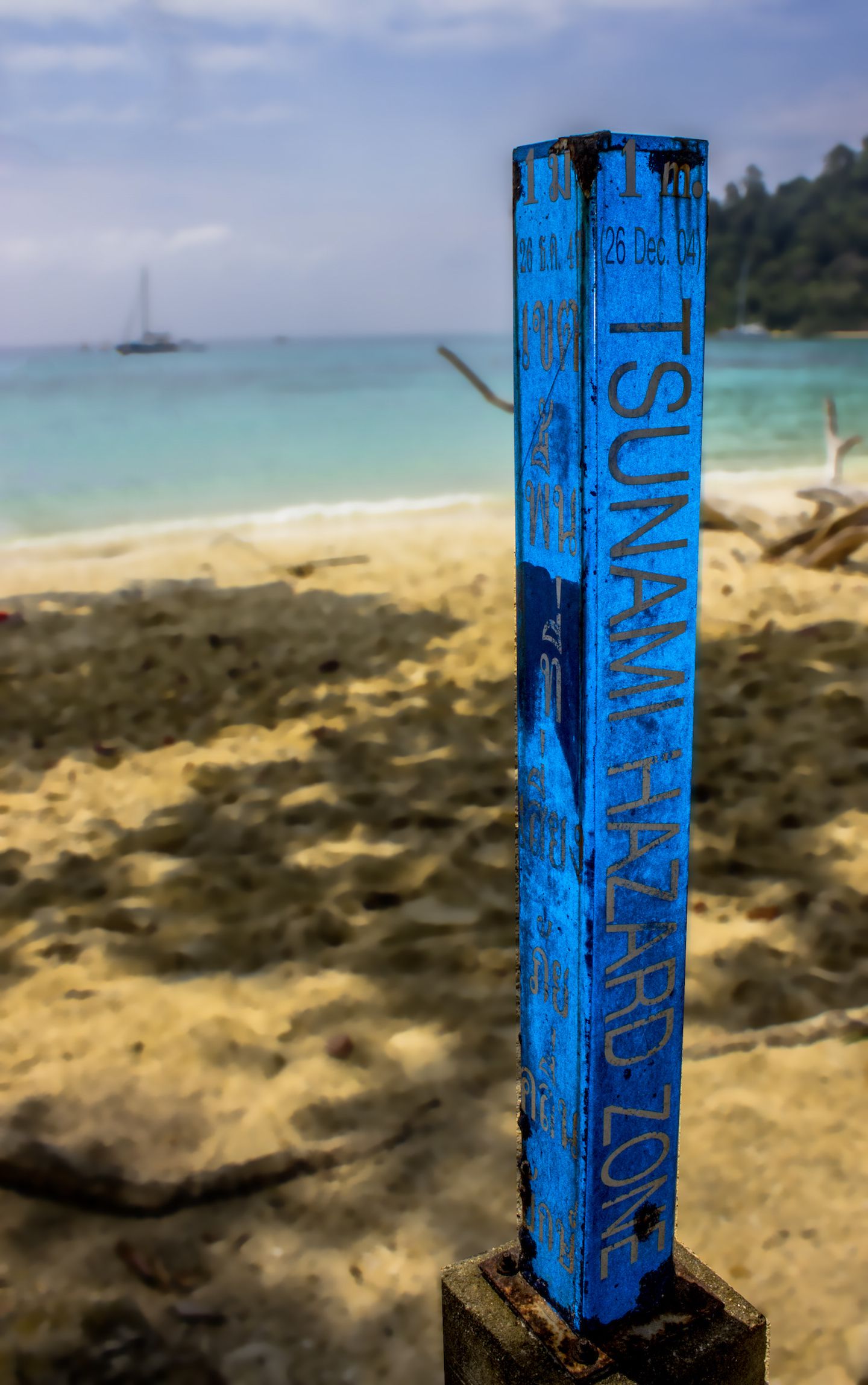 Post marking the water level during the tsunami in 2004, Koh Rok Nok, Thailand