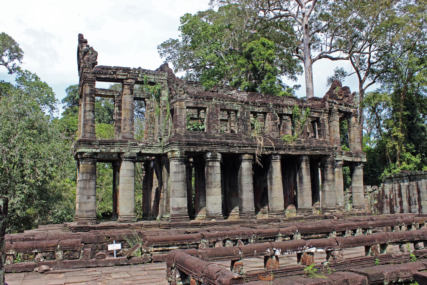 Two-story building with round columns at Preah Khan
